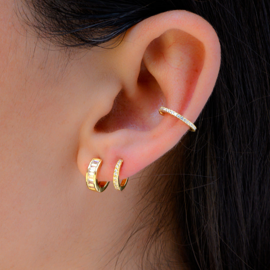 gold huggie and baguette huggie with diamond ear cuff