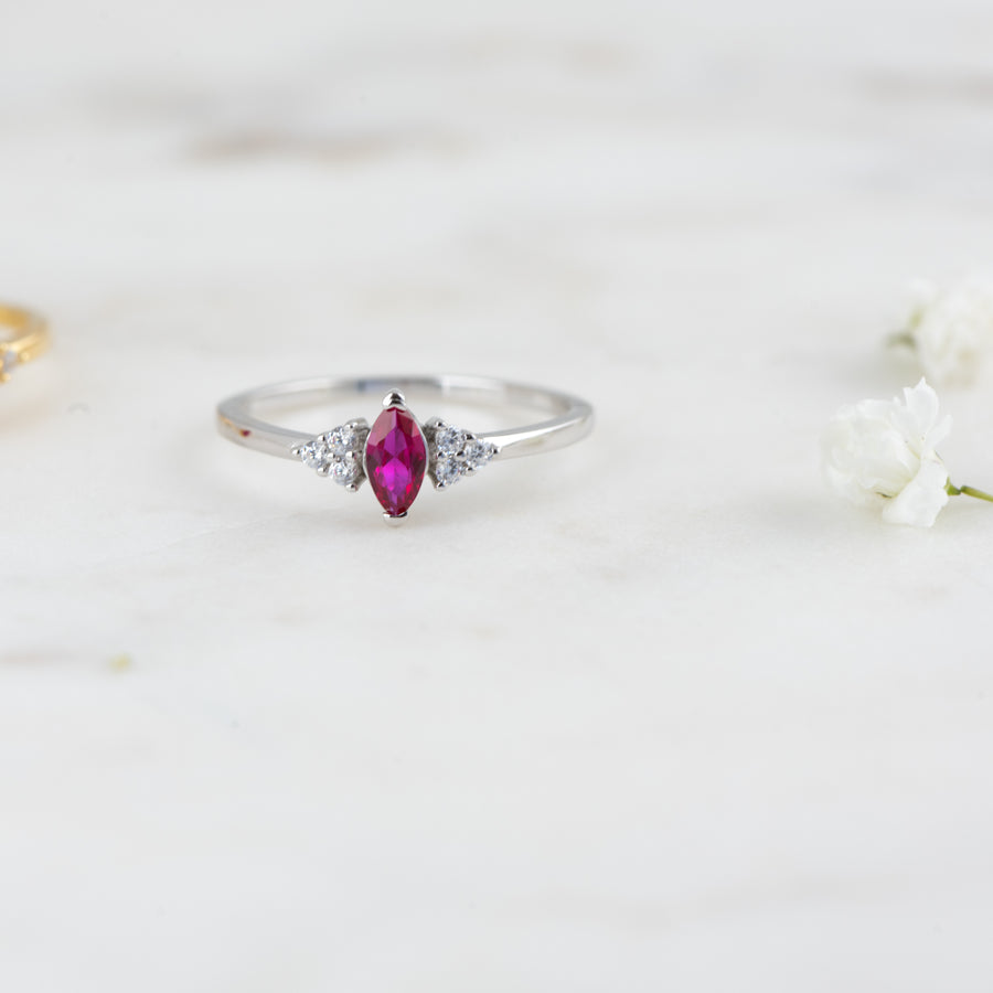 silver ruby marquise ring with cz on the sides