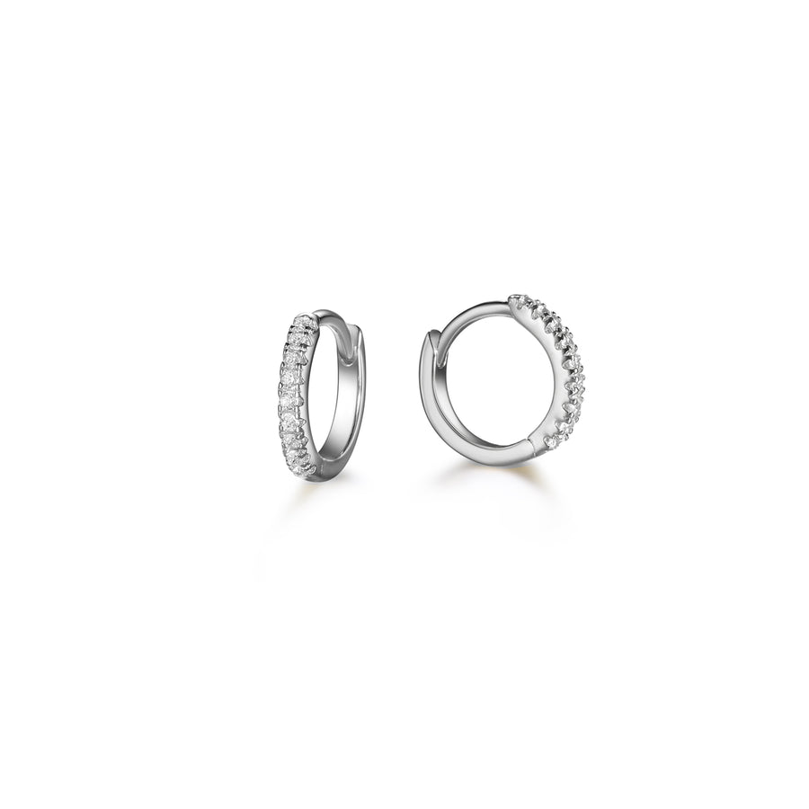 pair of silver diamond huggie earrings made of 925 sterling silver 