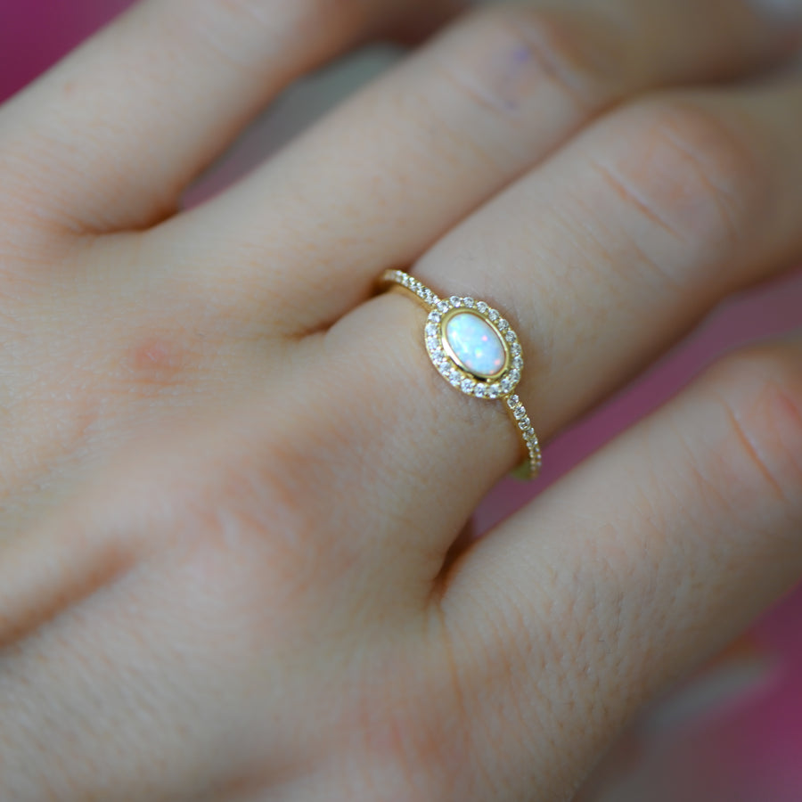 opal oval shaped gold cz ring