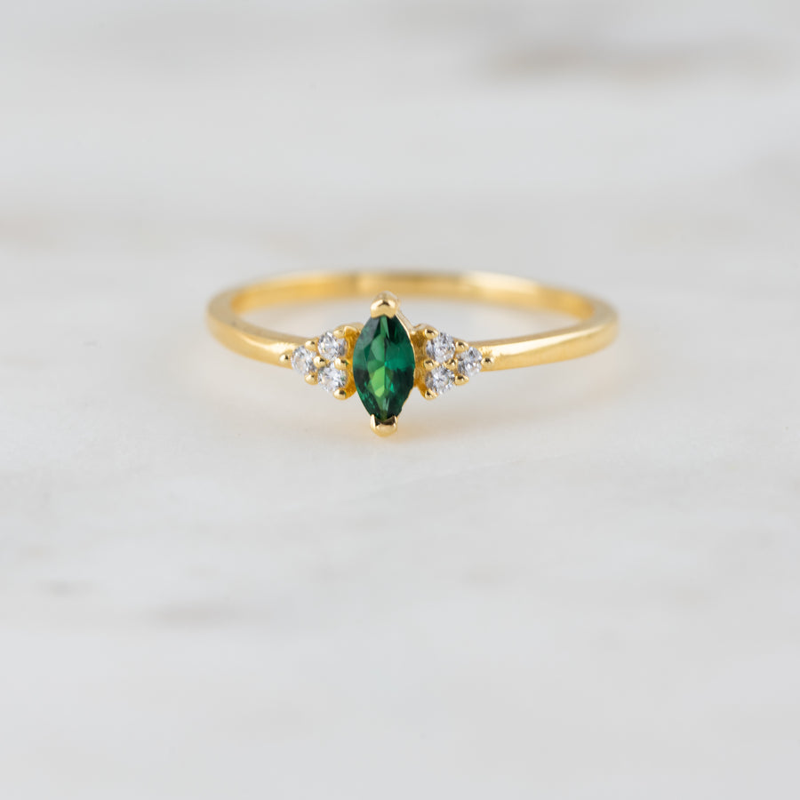 gold emerald marquise ring