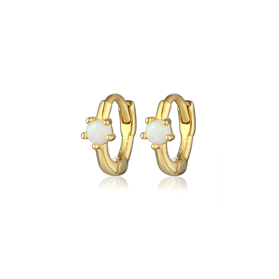 pair of gold small hoop earrings with a opal center stone