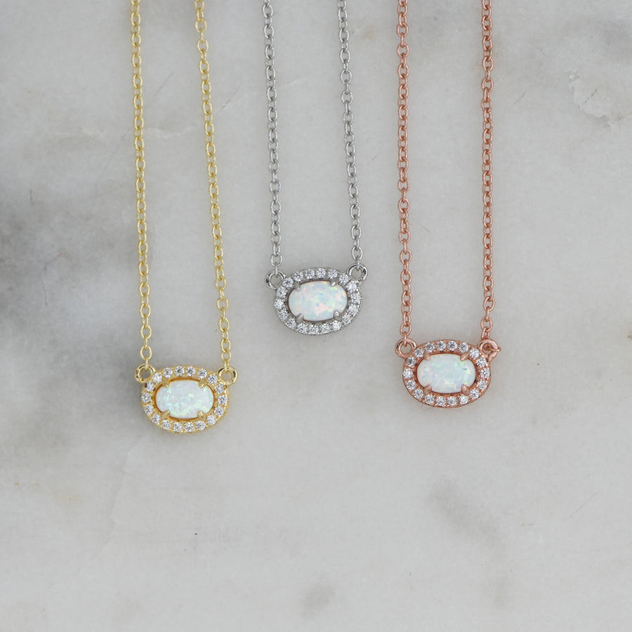 dainty opal necklaces in gold, silver, and rose gold