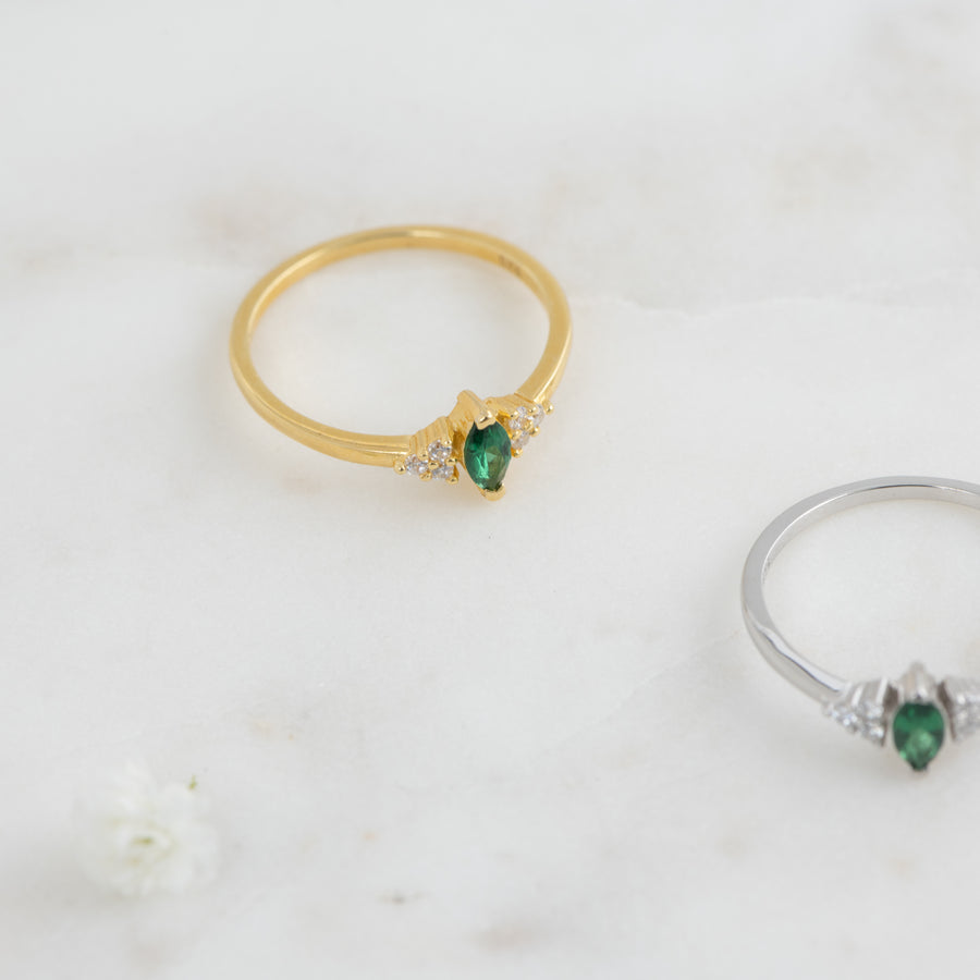 gold and silver marquise emerald ring