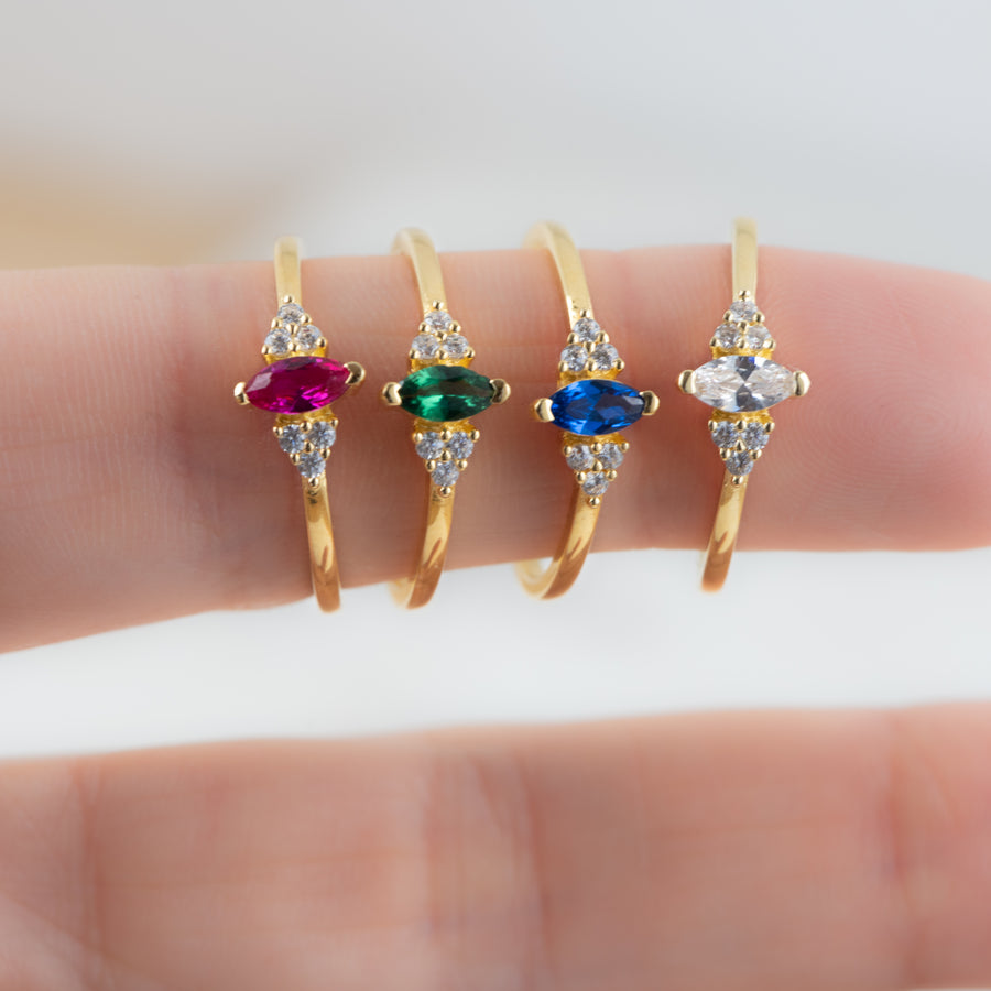 ruby, emerald, sapphire, and white cz marquise rings