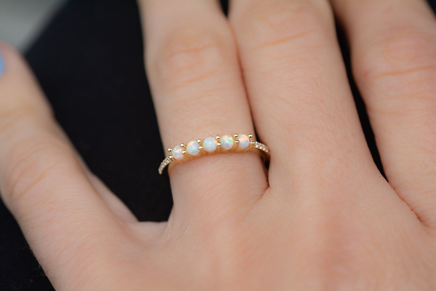 gold opal stacking ring with 5 small opal stones