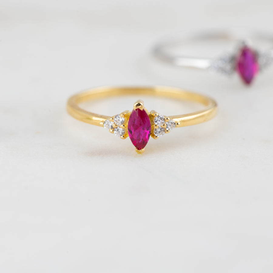 ruby with cz on the sides marquise ring